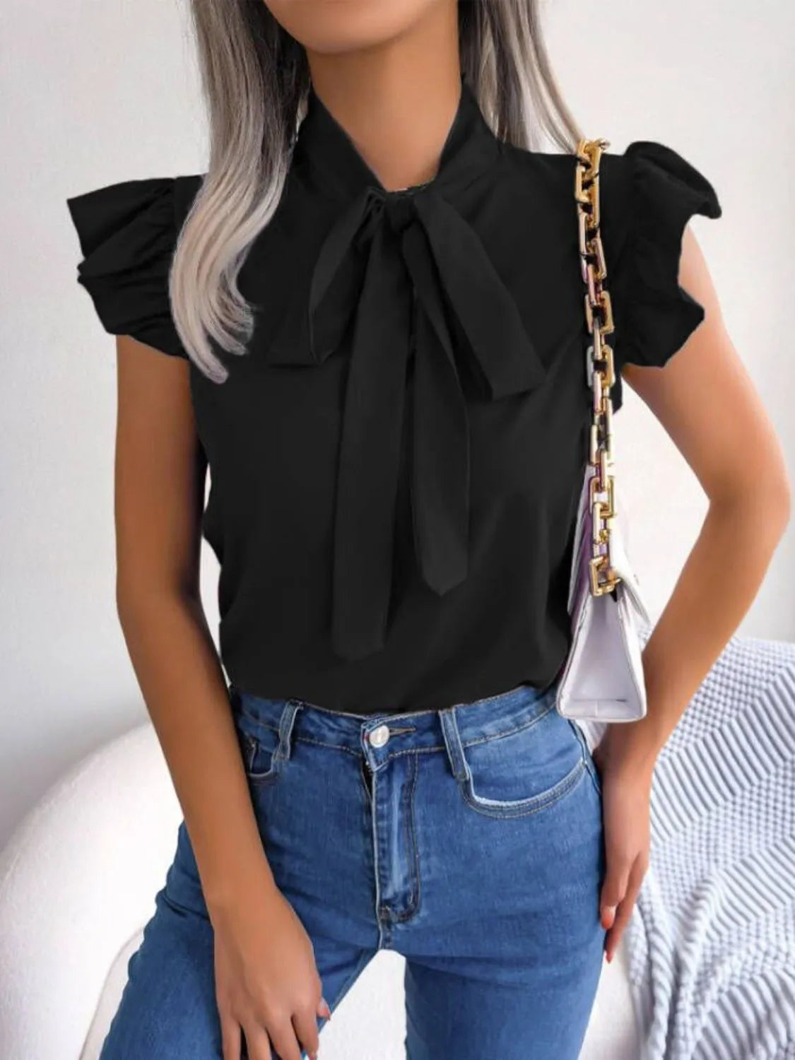 Moa | Elegant blouse with ruffle sleeve and tie band at the front
