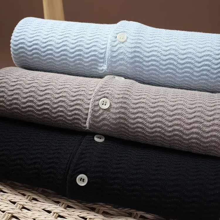 Aron | Structured knitted polo shirt with buttons at the front