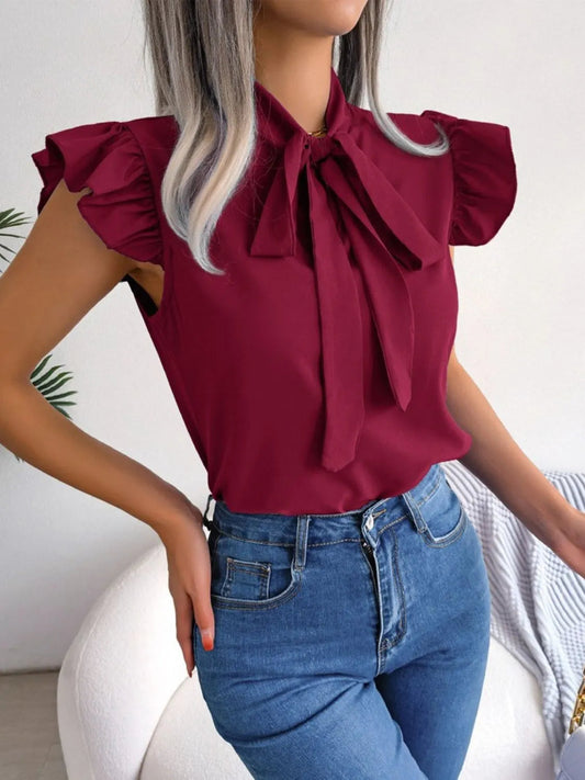 Moa | Elegant blouse with ruffle sleeve and tie band at the front